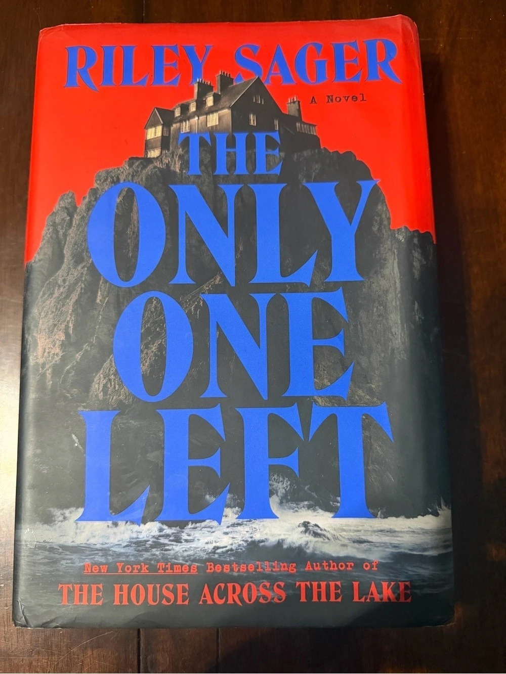 The Only One Left by Riley Sager Hardcover Novel Red & Blue